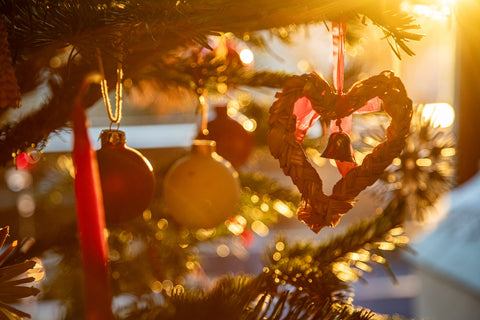 A close up of a christmas tree with ornaments